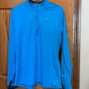 Blue Nike Dri-Fit top 1/4 zip